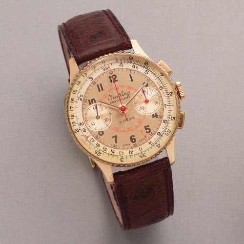 Breitling. An 18K gold manual wind chronograph wristwatch