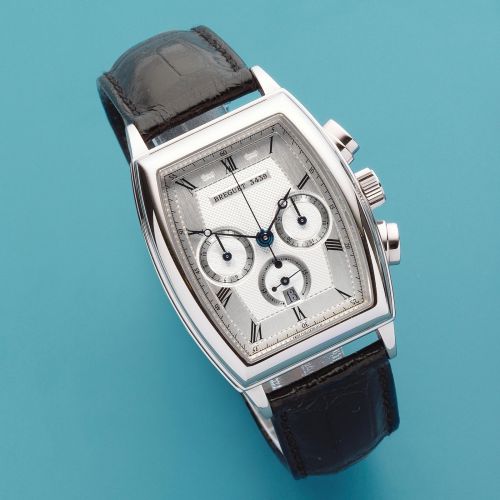 Breguet. An 18K white gold automatic calendar chronograph tonneau form wristwatch