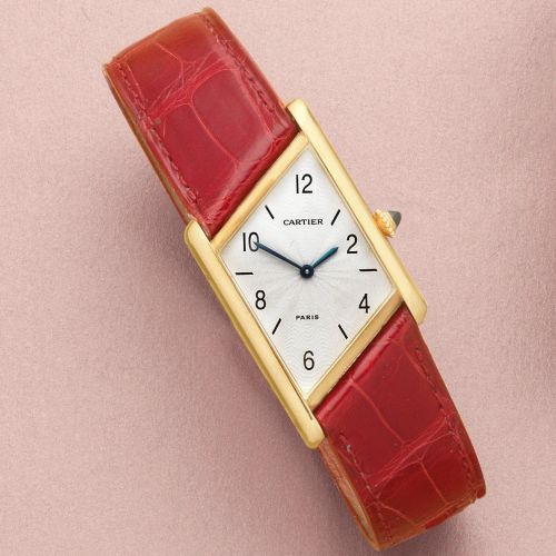 Cartier. An 18K gold manual wind asymmetrical wristwatch