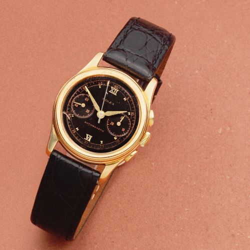 Rolex. A rare and early small 18K rose gold manual wind chronograph wristwatch