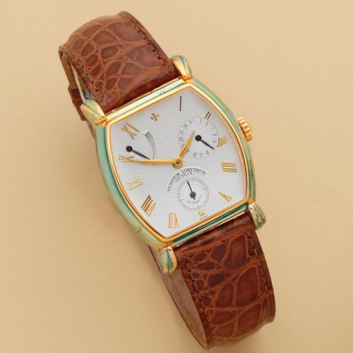 Vacheron Constantin. An 18K gold automatic calendar commemoration wristwatch with power reserve