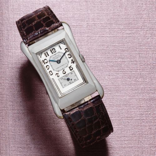 Rolex. A fine and rare platinum manual wind rectangular wristwatch