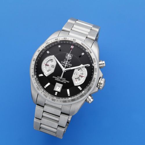 TAG Heuer. A stainless steel automatic calendar chronograph bracelet watch