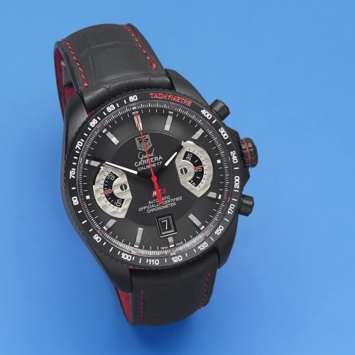 TAG Heuer. A black DLC coated stainless steel automatic calendar chronograph wristwatch