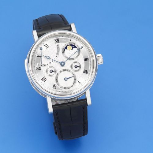 Breguet. A very fine and rare manual wind minute repeating perpetual calendar wristwatch with power reserve