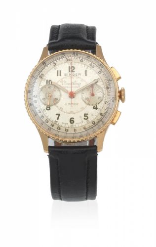 Breitling. An 18K gold manual wind chronograph wristwatch Retailed by Singer