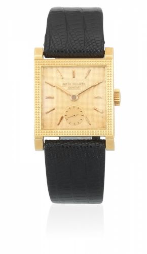 Patek Philippe. An 18K gold manual wind square wristwatch