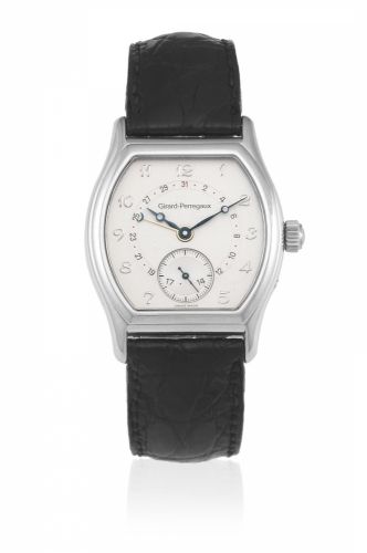 Girard Perregaux. A stainless steel automatic calendar tonneau form wristwatch