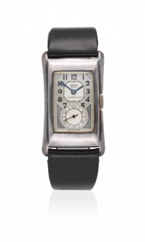 Rolex. A silver manual wind rectangular wristwatch