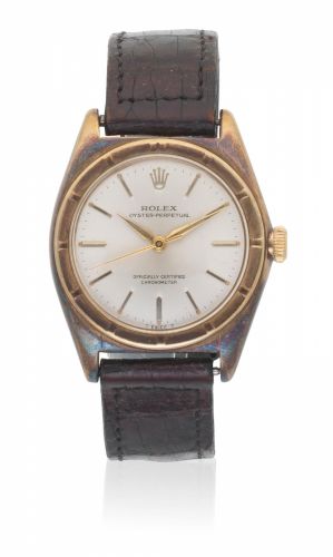 Rolex. A 9K gold automatic bubbleback wristwatch