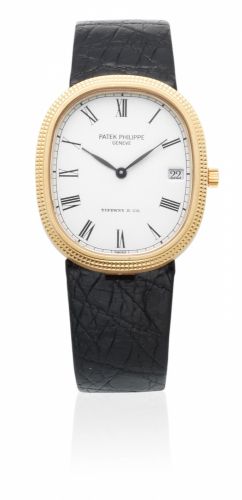 Patek Philippe. An 18K gold manual wind wristwatch Retailed by Tiffany Co