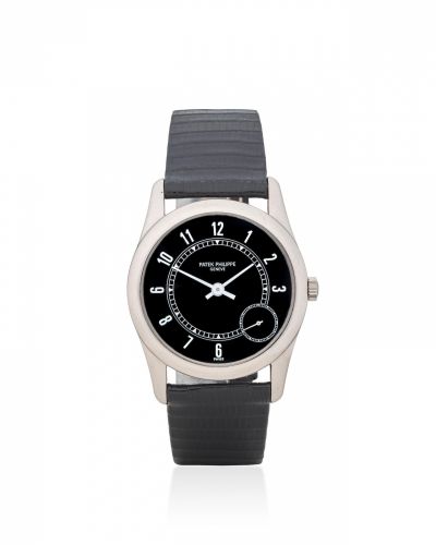 Patek Philippe. A fine 18K white gold automatic black dial wristwatch with eccentric seconds