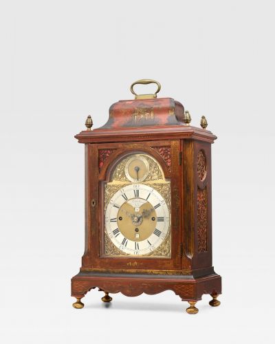A red japanned Quarter Chiming table Clock with Alarm