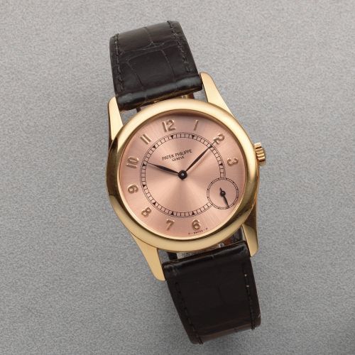 Patek Philippe. An 18K rose gold automatic wristwatch with offset seconds
