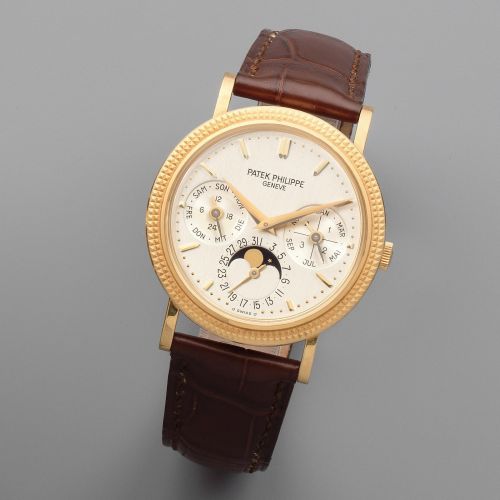 Patek Philippe. A fine 18K gold automatic perpetual calendar wristwatch with moon phase