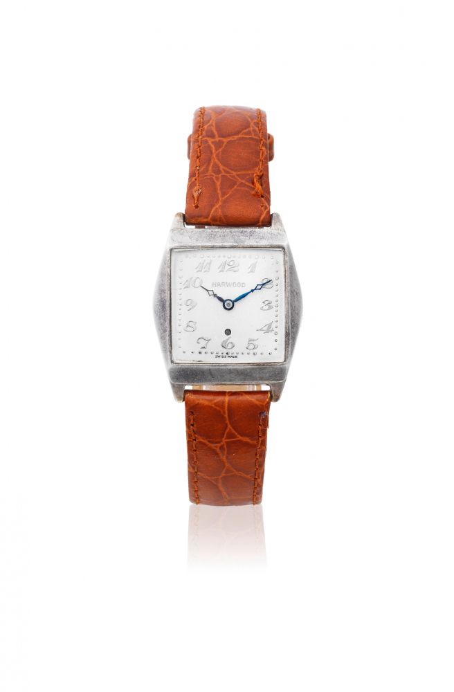 Harwood. A silver automatic tonneau form wristwatch
