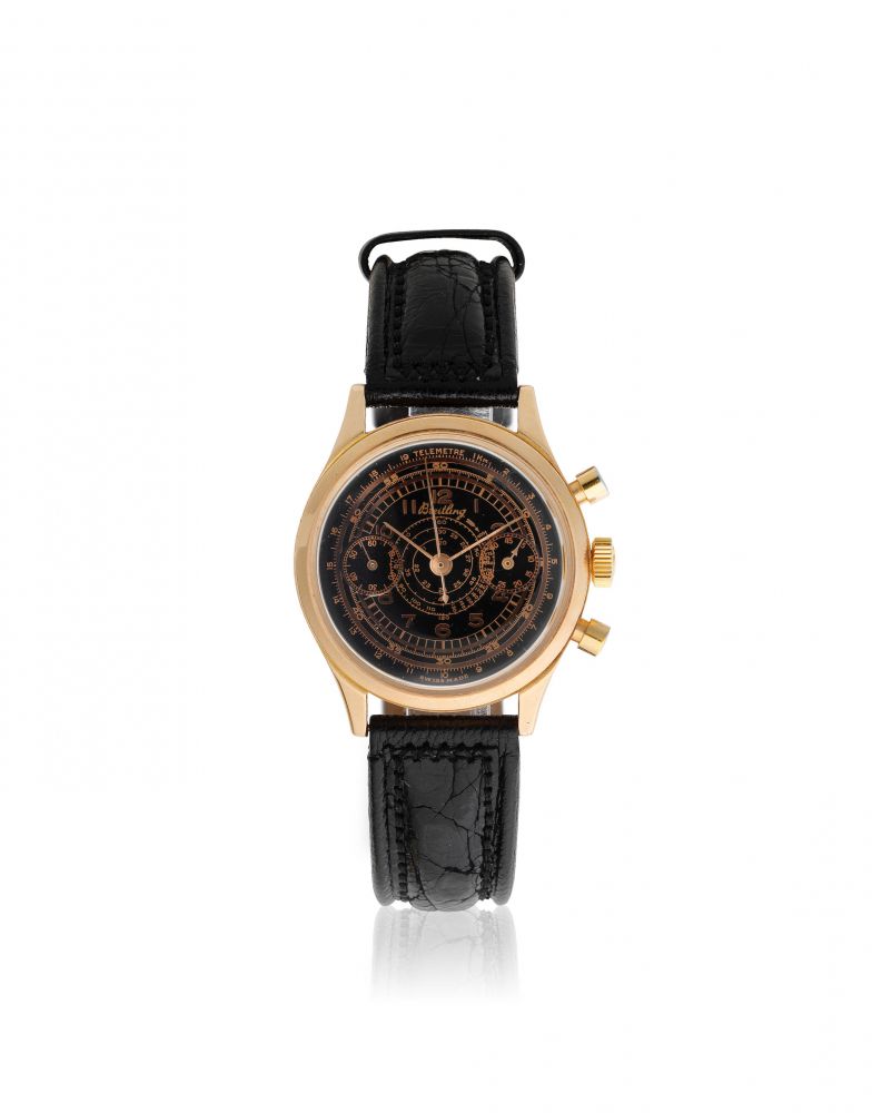 Breitling. An 18K rose gold manual wind chronograph wristwatch
