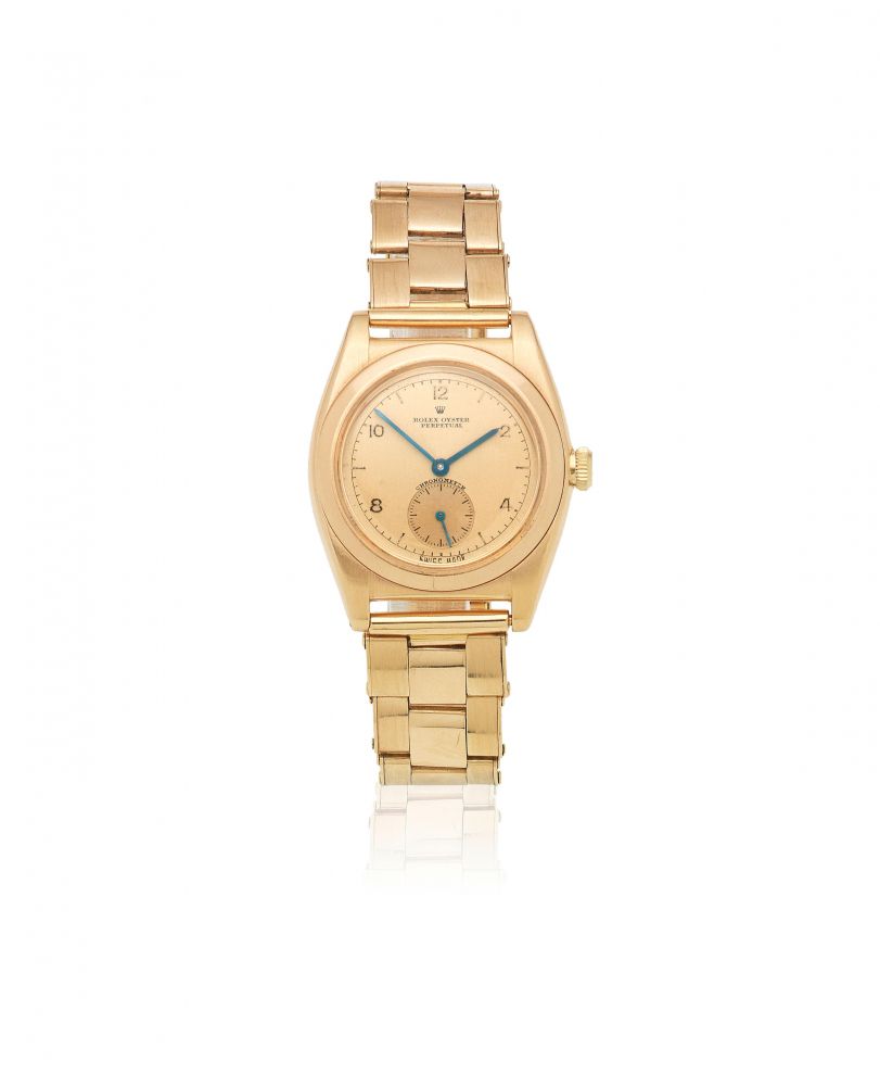 Rolex. An 18K rose gold automatic bracelet watch
