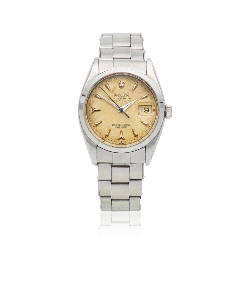 Rolex. A stainless steel automatic calendar bracelet watch with roulette date wheel