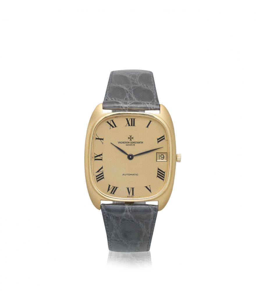 Vacheron Constantin. An 18K gold automatic calendar cushion form wristwatch