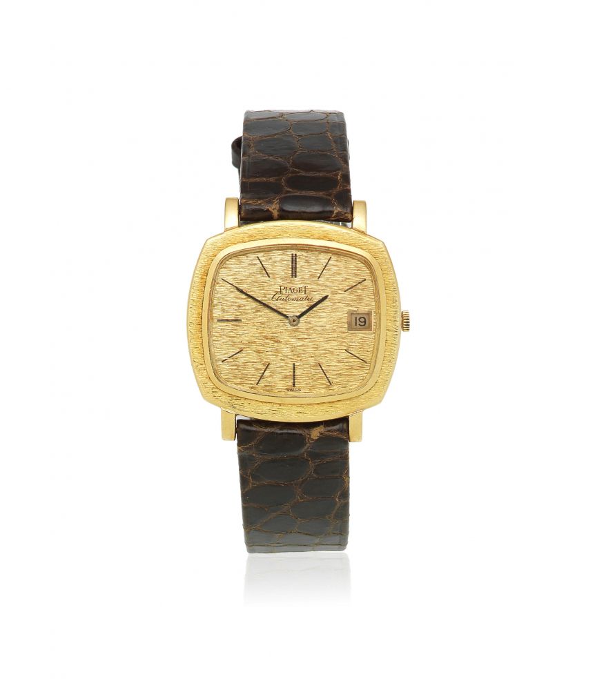 Piaget. An 18K gold automatic cushion form calendar wristwatch