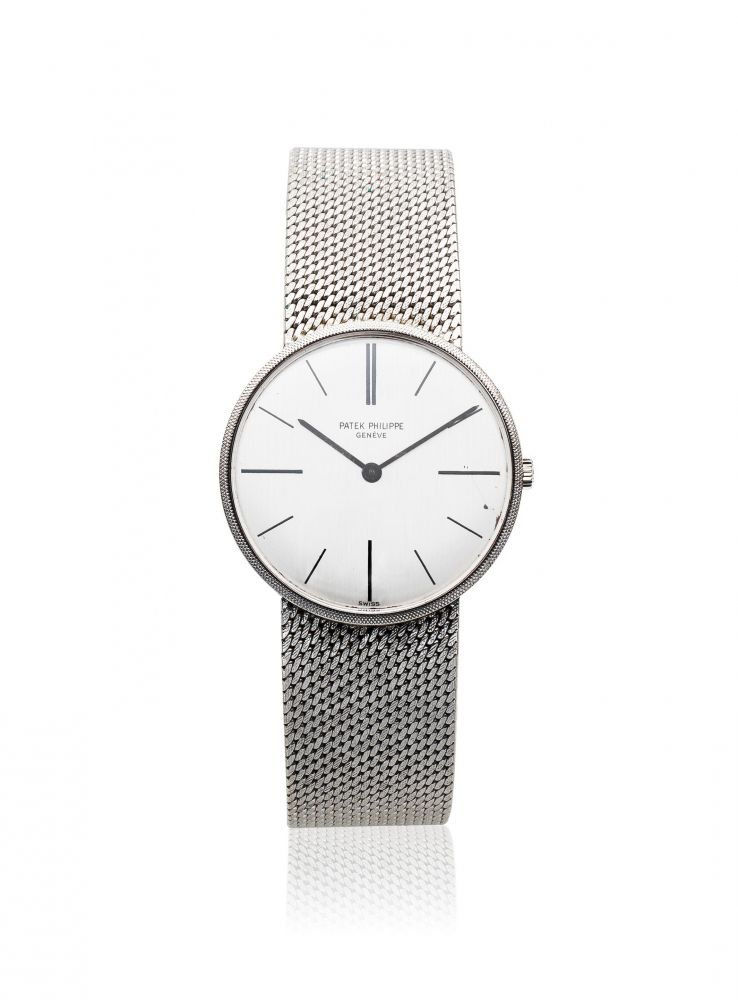 Patek Philippe. An 18K white gold mid-size manual wind bracelet watch