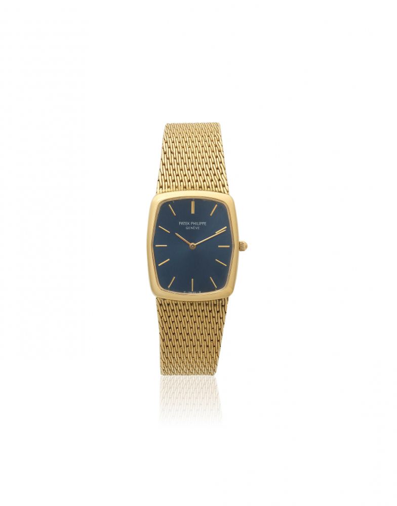 Patek Philippe. A mid-size 18K gold quartz rectangular bracelet watch