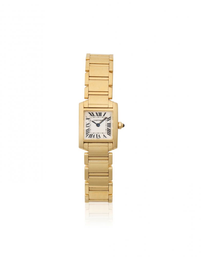 Cartier. A lady's 18K gold quartz rectangular bracelet watch
