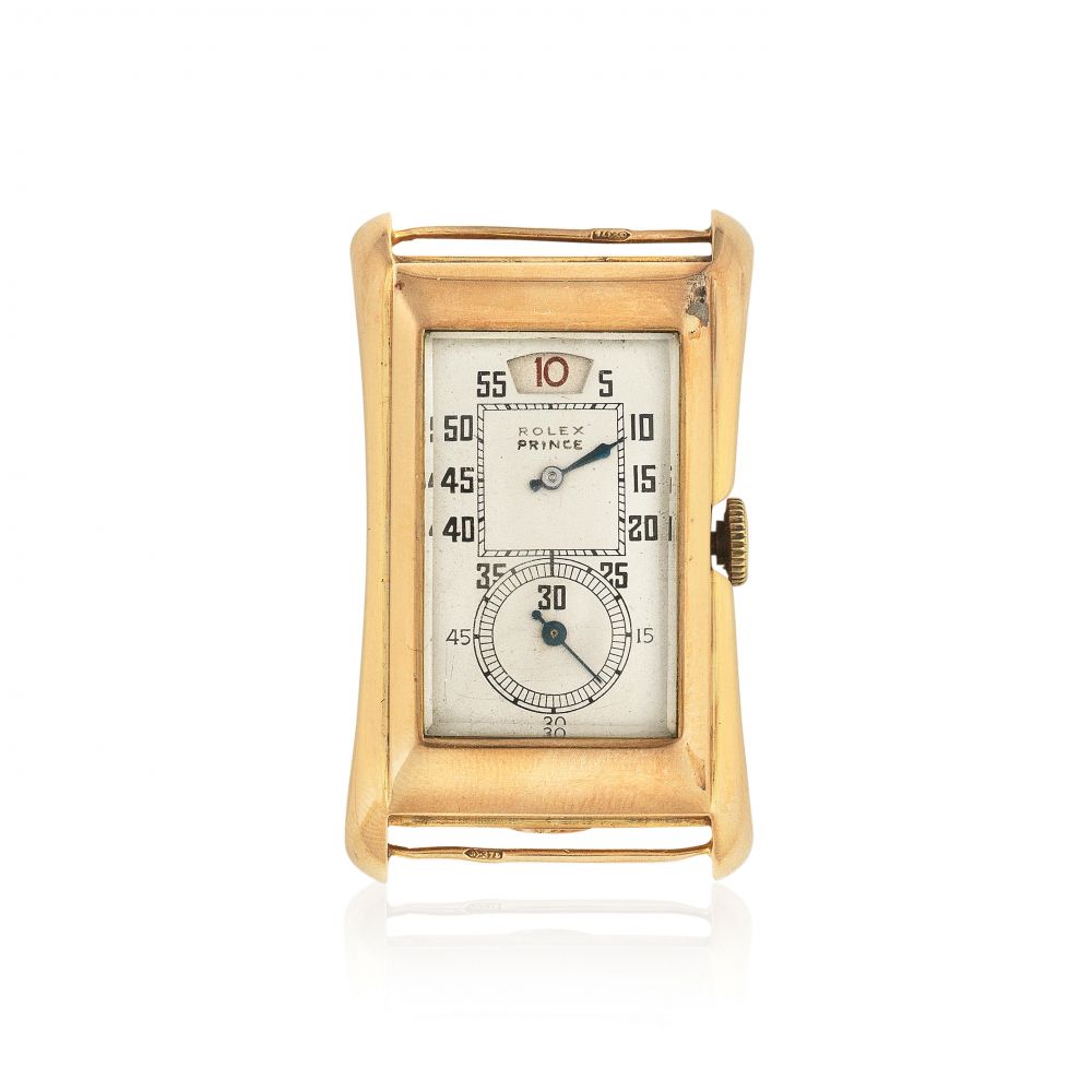 Rolex. A rare 9K gold manual wind jump hour wristwatch