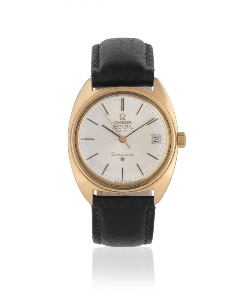 Omega. An 18K gold automatic calendar wristwatch