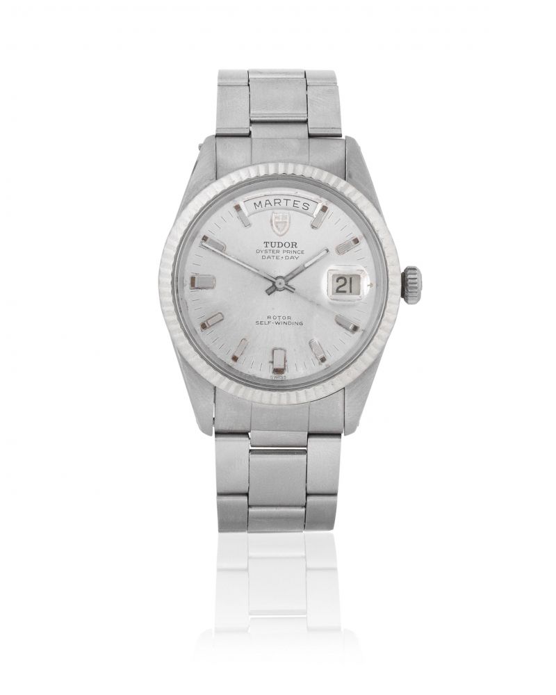 Tudor. A stainless steel and white gold automatic calendar bracelet watch