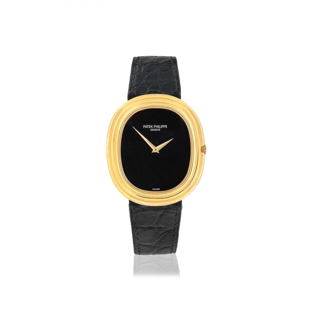Patek Philippe. An 18K gold automatic oval wristwatch