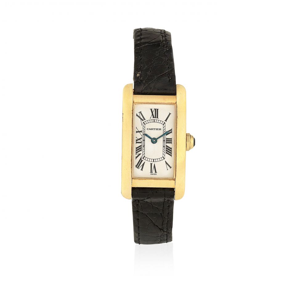 Cartier. A lady's 18K gold rectangular quartz wristwatch