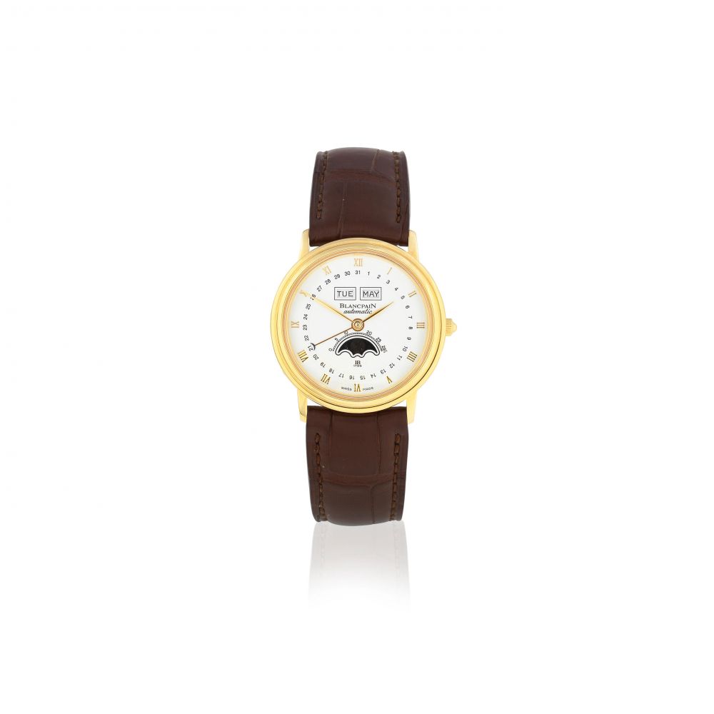 Blancpain. An 18K gold automatic annual triple calendar wristwatch with moon phase