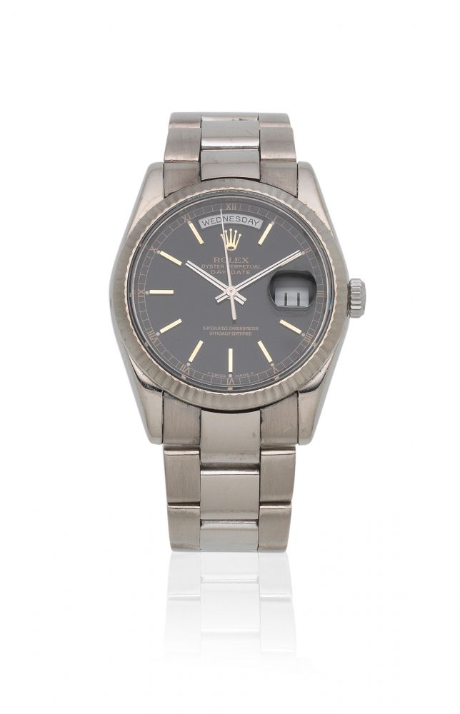 Rolex. A fine 18K white gold automatic calendar bracelet watch