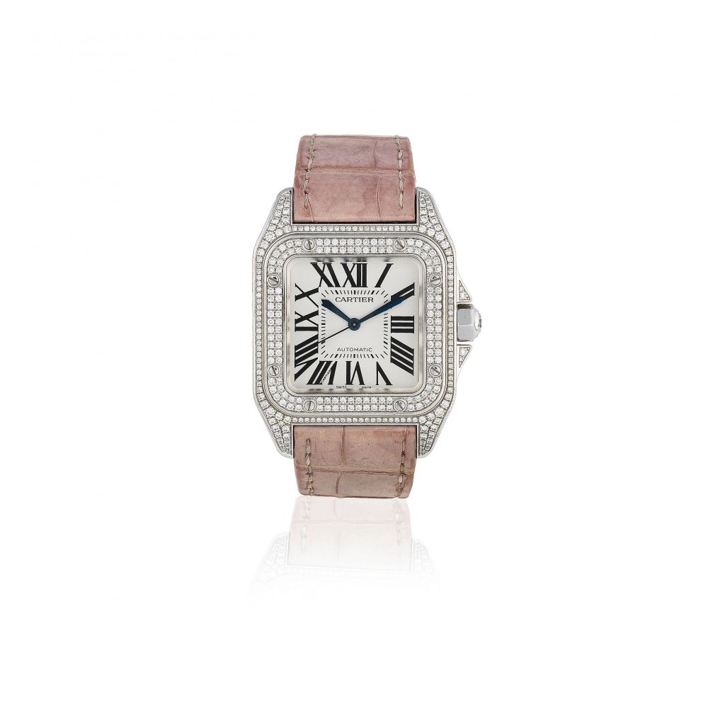 Cartier. An 18K white gold and diamond set automatic wristwatch to be sold with proceeds going to the charity Children in Need