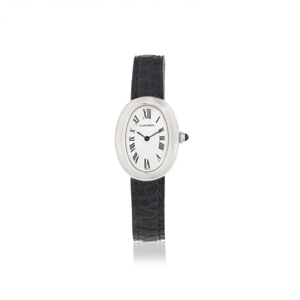 Cartier. A lady's 18K white gold quartz oval wristwatch