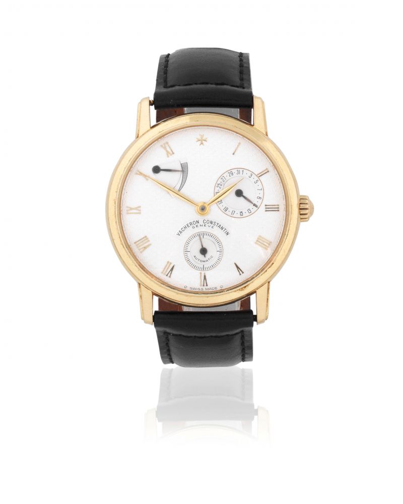 Vacheron Constantin. An 18K gold automatic calendar wristwatch with power reserve