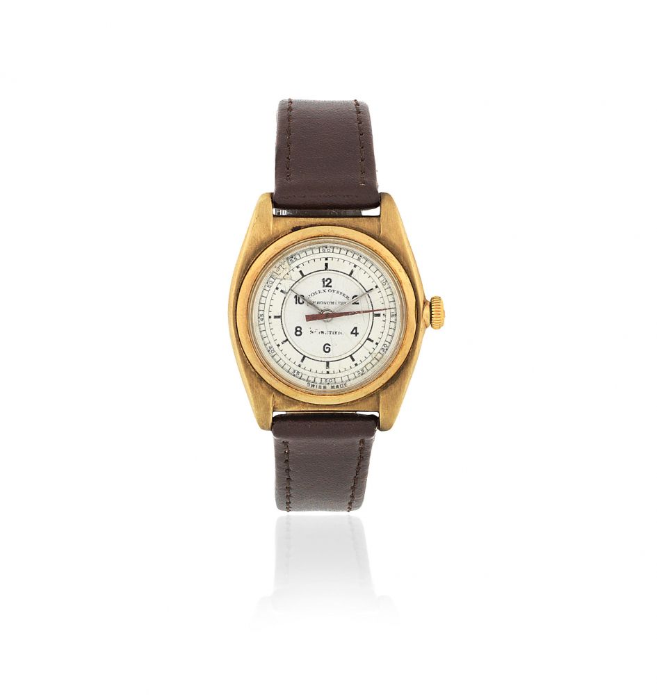 Rolex. A 9K gold manual wind chronometer wristwatch