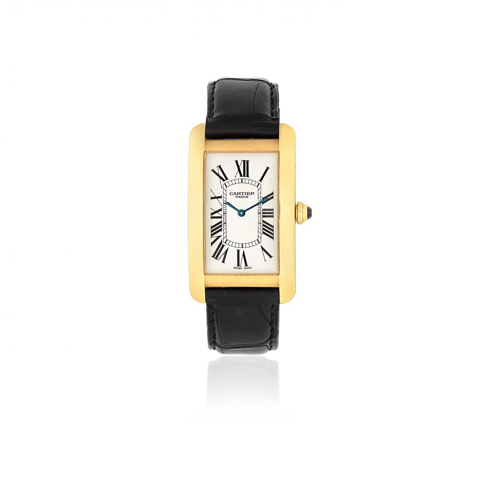 Cartier. An 18K gold manual wind rectangular wristwatch