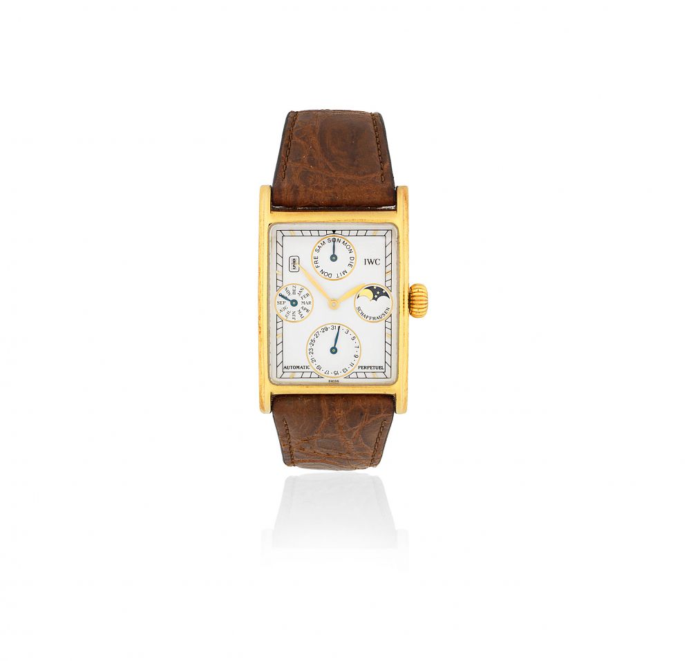 IWC. An 18K gold automatic perpetual calendar rectangular wristwatch with leap year indication