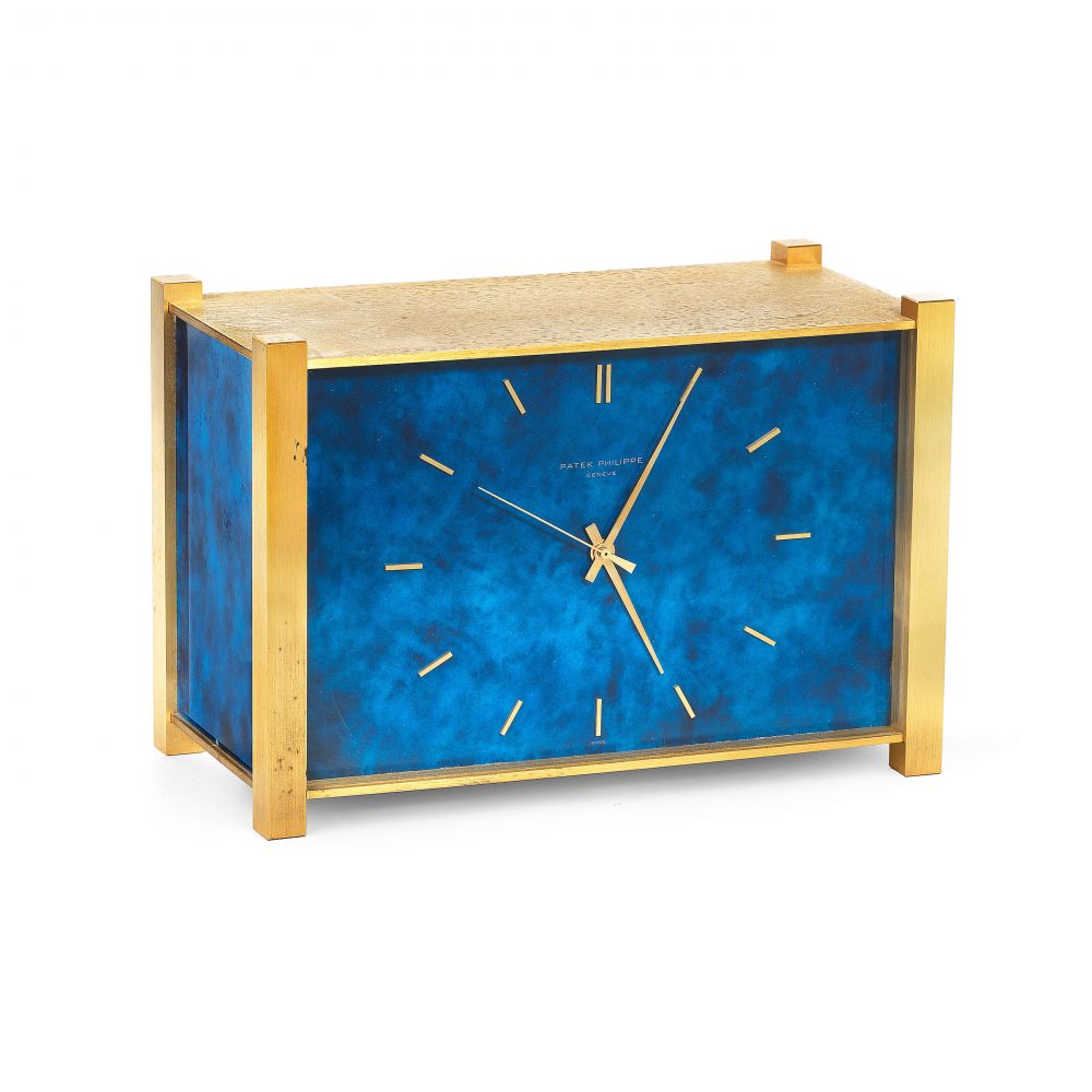Patek Philippe. A gilt brass and blue lacquered electronic quartz desk clock