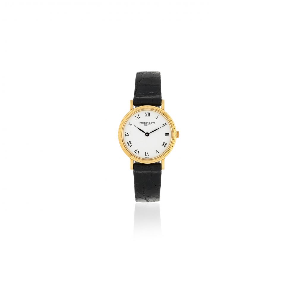 Patek Philippe. A lady's 18K gold quartz wristwatch