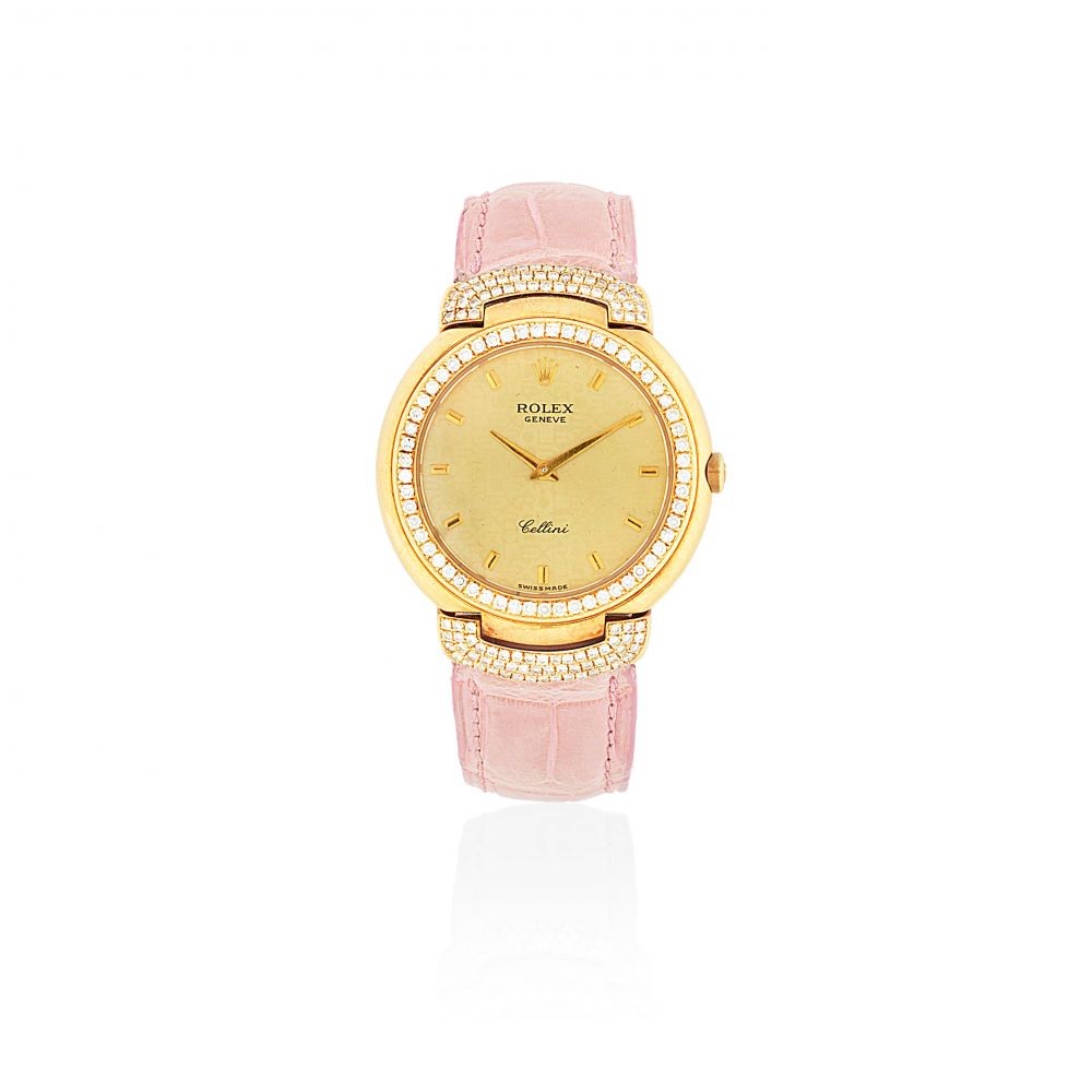 Rolex. A mid-size 18K gold and diamond set quartz wristwatch
