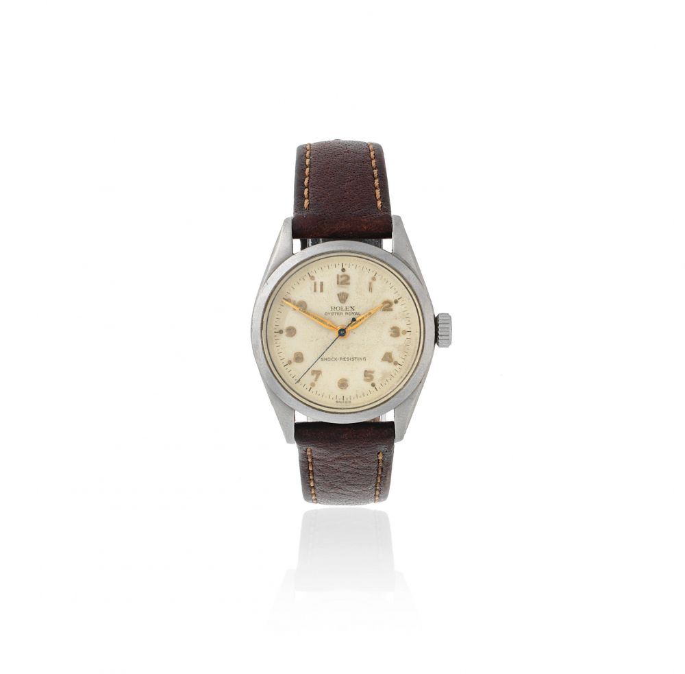 Rolex. A stainless steel manual wind wristwatch