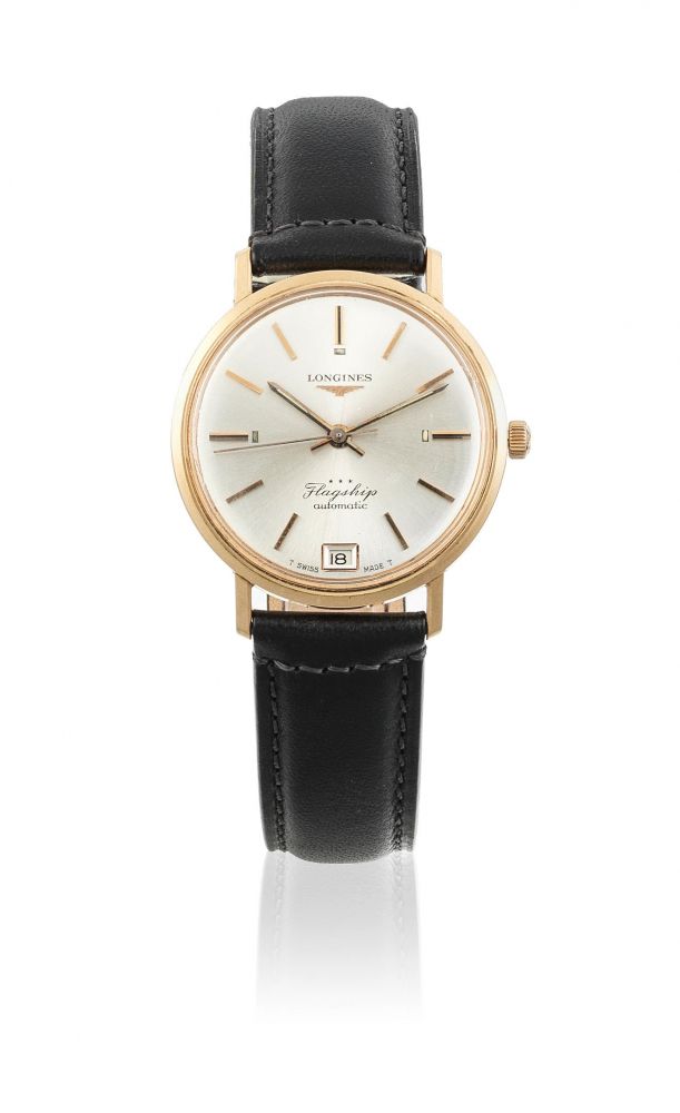 Longines. An 18K gold automatic calendar wristwatch