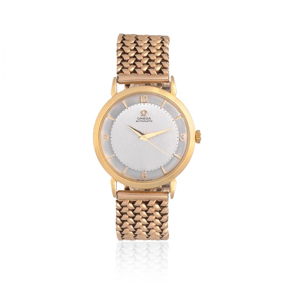 Omega. An 18K gold automatic wristwatch with 9K gold associated bracelet