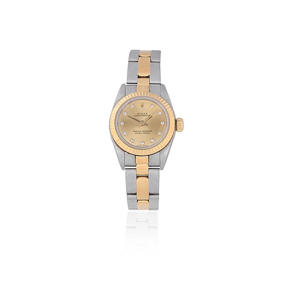 Rolex. A lady's stainless steel and gold diamond set automatic bracelet watch