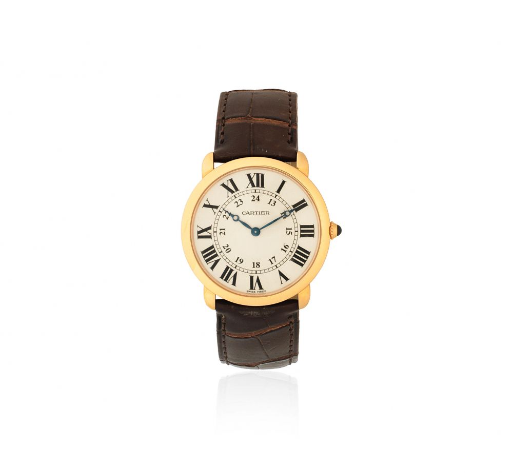 Cartier. An 18K gold manual wind wristwatch