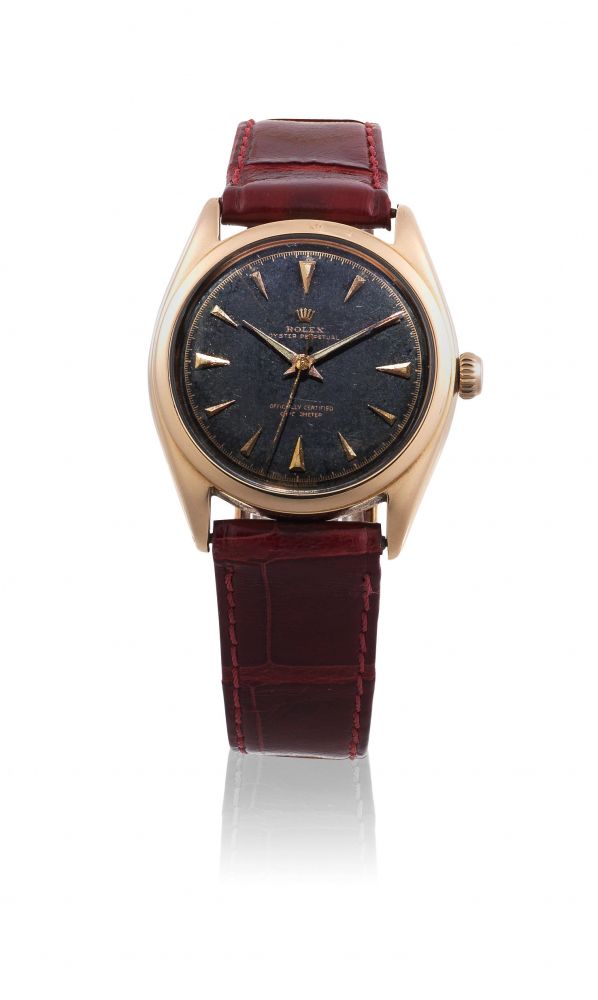 Rolex. An 18K rose gold automatic wristwatch